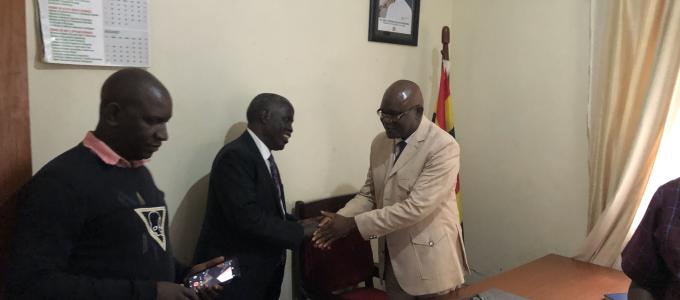 RDC mr. KYASANKU CHARLES HANDING OVER OFFICE TO MR. KIBWIKA MICHEAL